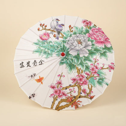 Decorative umbrella with floral and bird design