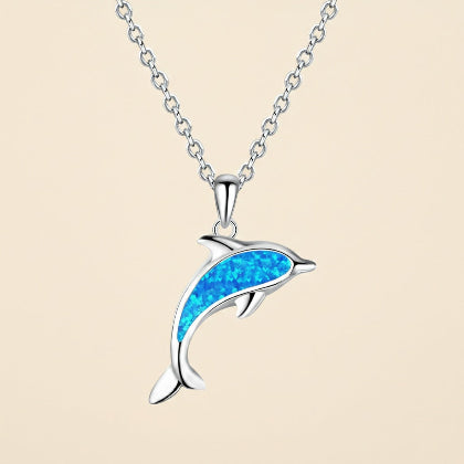 Dolphin-shaped pendant with blue opal inlay