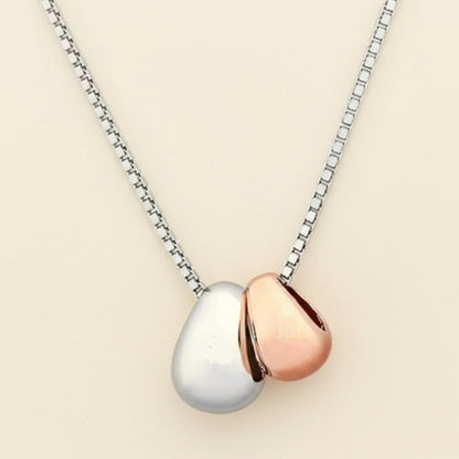 Necklace with two pendants, one silver and one rose gold
